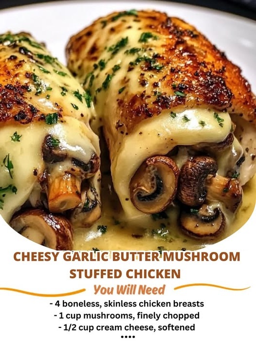 Golden-brown chicken breasts stuffed with melted cheese, garlic butter, and sautéed mushrooms, served on a rustic plate.