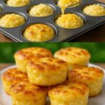 Golden-brown cheesy mashed potato puffs garnished with chopped chives.