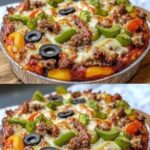 A savory low-carb crustless pizza bowl filled with layers of melted cheese, pepperoni, vegetables, and marinara sauce, served in a bowl ready to be enjoyed.