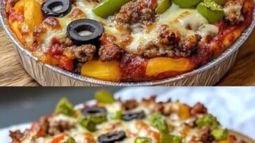 A savory low-carb crustless pizza bowl filled with layers of melted cheese, pepperoni, vegetables, and marinara sauce, served in a bowl ready to be enjoyed.