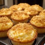 Golden brown cheddar crumbly puffs baked in a muffin pan, topped with crispy cheese and savory crumbs.