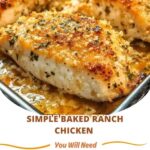 Juicy baked ranch chicken breasts garnished with herbs, served in a baking dish with a golden, seasoned coating.